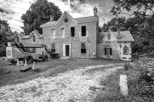 1760s two-story house waised slightly and cross gable added in 1